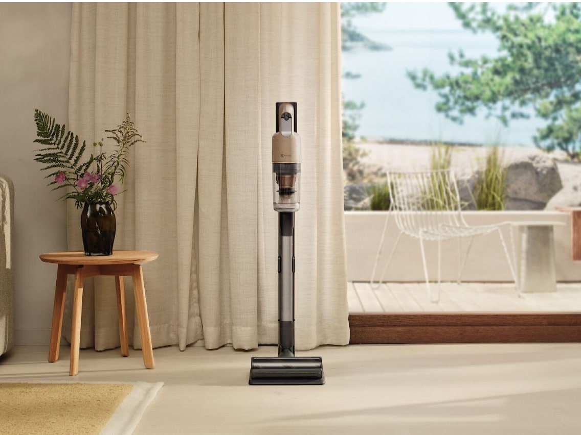 Vacuum cleaner standing in a room